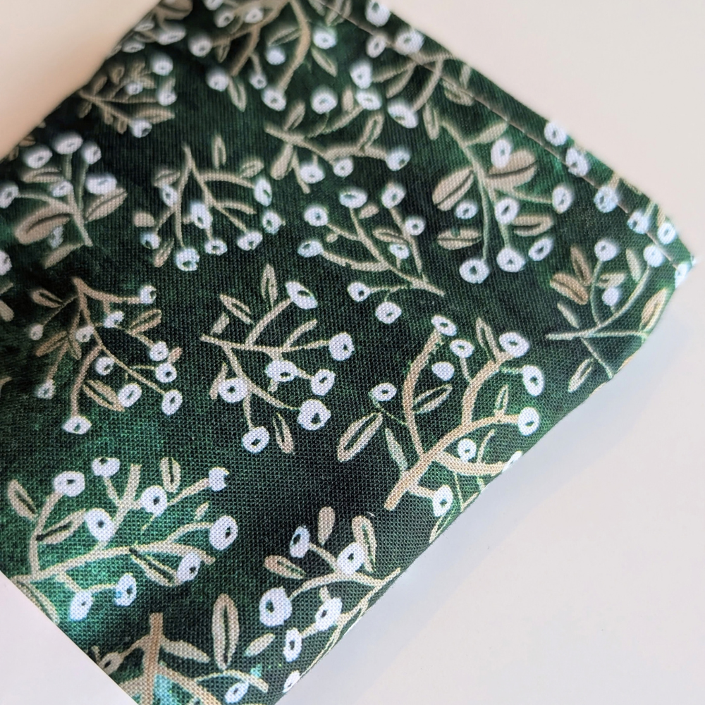 close up of a DARK green sage botanical pattern lavender eye pillow by yogion wellness