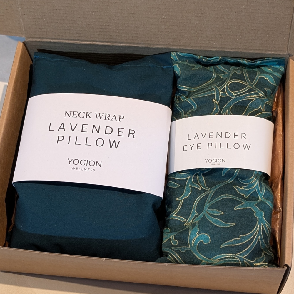 emerald green neck wrap and lavender eye pillow with gold detailed fabric packaging gift set by yogion wellness