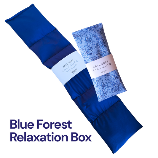 Blue Forest Relaxation Box with neck pillow and eye pillow on a white background