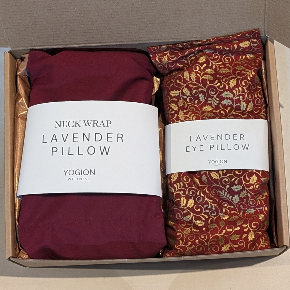 Two lavender pillows, one neck wrap and one eye pillow, in a box for christmas gift