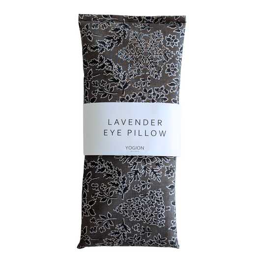 Lavender eye pillow with floral christmas pattern packaging on a white background