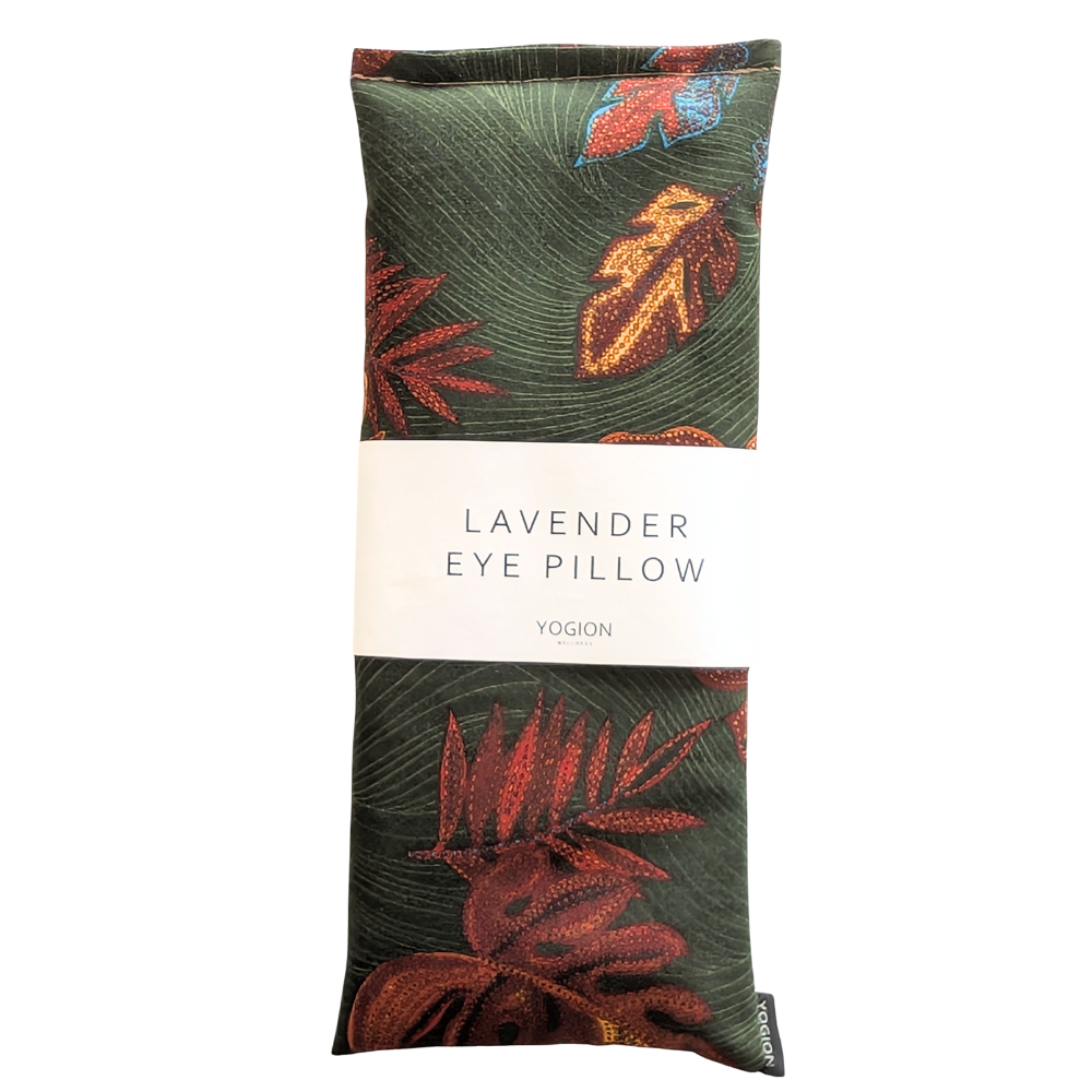 Lavender eye pillow with leaf pattern packaging on a white background