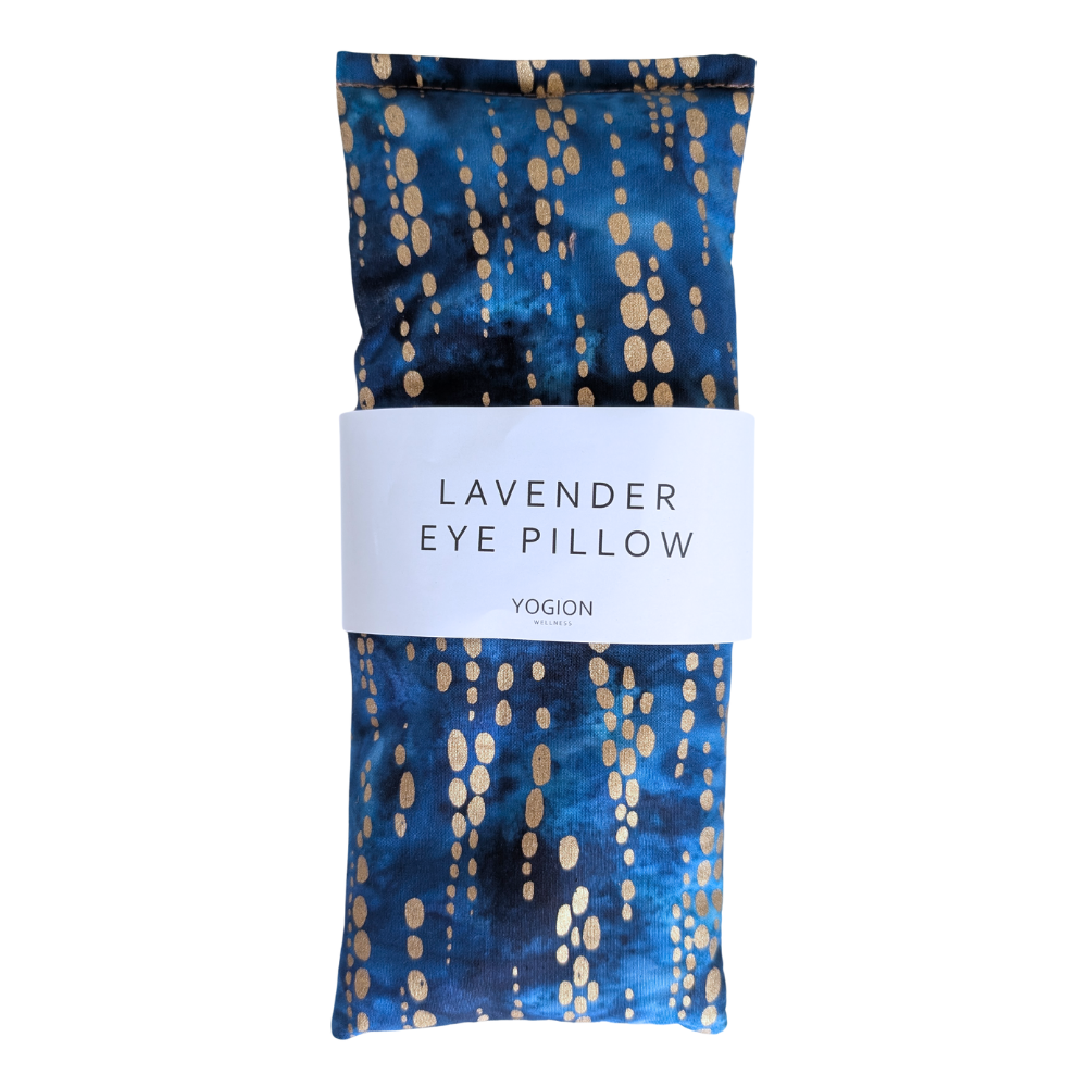 Lavender eye pillow with blue and gold pattern on a white background