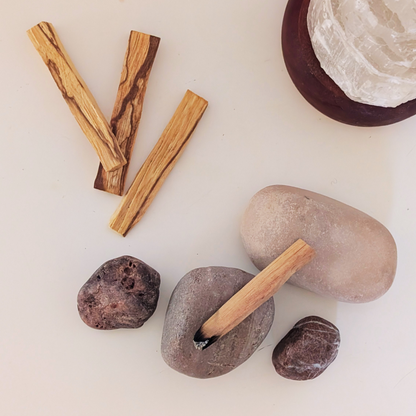 palo santo sticks top view with rocks and celestite 