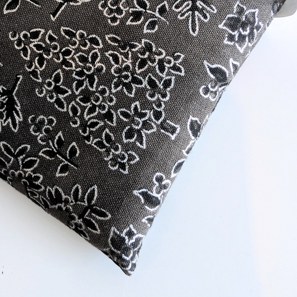Lavender eye pillow with floral christmas pattern packaging on a white background